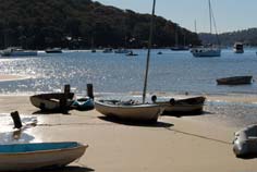 sydney northern beaches - boats on a beach, pittwater